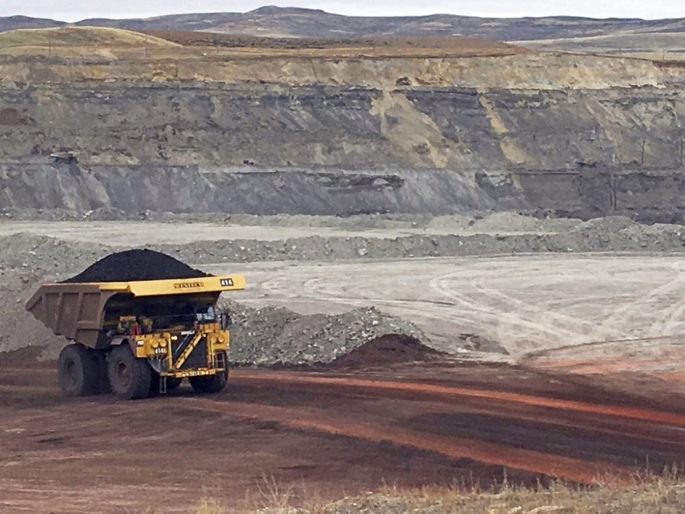 In this March 28, 2017, file photo, a dump truck hauls coal at Contura Energy's Eagle Butte Mine near Gillette, Wyo. THE CANADIAN PRESS/AP/Mead Gruver, File