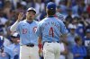 Chicago Cubs' Seiya Suzuki (27) celebrates with teammate Pete Crow-Armstrong (4) after defeating the Boston Red Sox in a baseball game Friday, July 18, 2025, in Chicago. (AP Photo/Paul Beaty)
