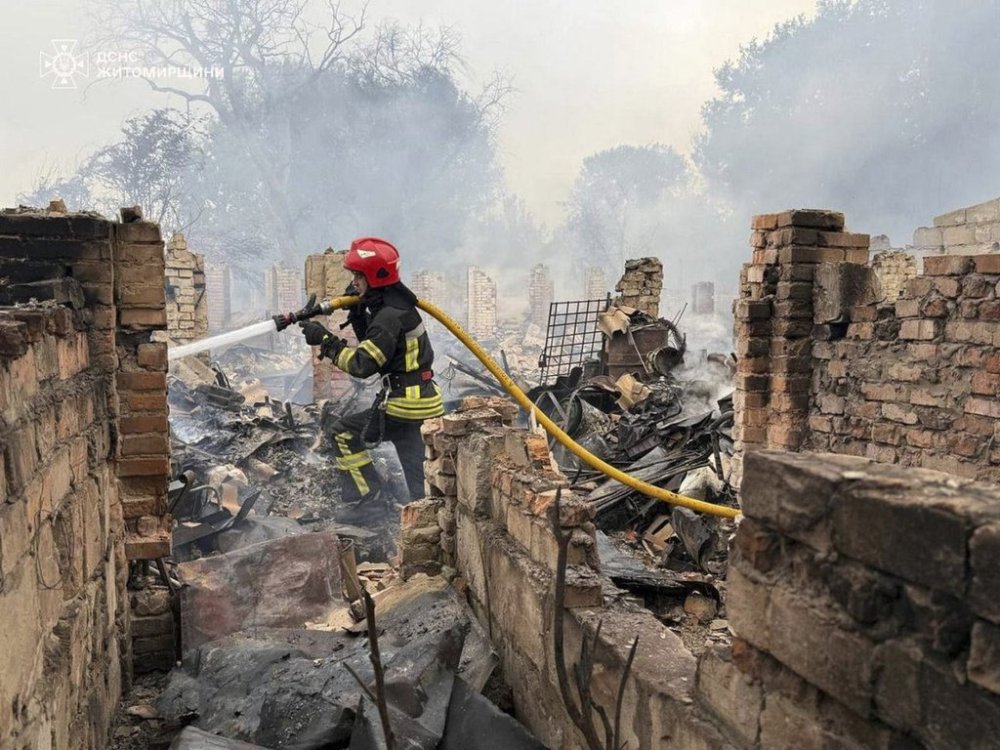 In this photo provided by the Ukrainian Emergency Service, firefighters put out the fire following a Russian attack in Zhytomyr region, Ukraine, Wednesday, July 9, 2025. (Ukrainian Emergency Service via AP)