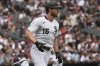 Chicago White Sox's Austin Slater runs after hitting a one-run single during the fifth inning of a baseball game against the Cleveland Guardians in Chicago, Sunday, July 13, 2025. (AP Photo/Nam Y. Huh)