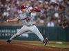 FILE - Arkansas pitcher Gage Wood throws to a Texas A&M batter during an NCAA college baseball game, May 17, 2024, in College Station, Texas. (Meredith Seaver/College Station Eagle via AP, File)