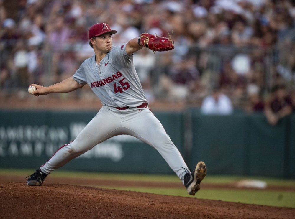 FILE - Arkansas pitcher Gage Wood throws to a Texas A&M batter during an NCAA college baseball game, May 17, 2024, in College Station, Texas. (Meredith Seaver/College Station Eagle via AP, File)