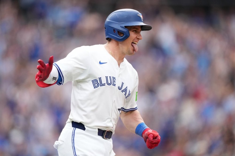 Toronto Blue Jays catcher Tyler Heineman (55) reacts after hitting a two-run home run during eighth-inning MLB action against the San Francisco Giants in Toronto on Saturday, July 19, 2025. THE CANADIAN PRESS/Nathan Denette