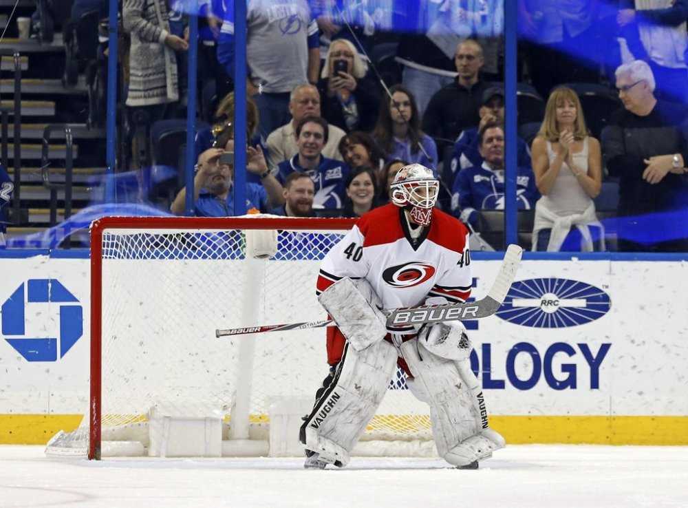 FILE - Carolina Hurricanes emergency backup goalie Jorge Alves makes his NHL debut during the third period of the team's NHL hockey game against the Tampa Bay Lightning on Dec. 31, 2016, in Tampa, Fla. (AP Photo/Mike Carlson, file)