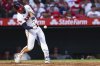 Los Angeles Angels designated hitter Mike Trout hits a home run during the fifth inning of a baseball game against the Arizona Diamondbacks in Anaheim, Calif., Saturday, July 12, 2025. (AP Photo/Jessie Alcheh)