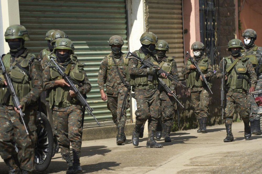 Soldiers patrol during an operation against alleged drug traffickers in La Mesilla, Guatemala, on the border with Mexico, Wednesday, July 30, 2025. (AP Photo/Moises Castillo)