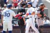 Toronto Blue Jays third base Addison Barger celebrates his two run home run with teammate catcher Alejandro Kirk (30) during fifth inning MLB action against the San Francisco Giants in Toronto on Sunday, July 20, 2025.  THE CANADIAN PRESS/Nathan Denette