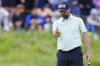 England's John Parry lines up a putt on the 2nd green during the third round of the British Open golf championship at the Royal Portrush Golf Club, Northern Ireland, Saturday, July 19, 2025. (Peter Byrne/PA via AP)