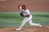 Texas Rangers starting pitcher Kumar Rocker throws to the Detroit Tigers in the fourth inning of a baseball game, Saturday, July 19, 2025, in Arlington, Texas. (AP Photo/Tony Gutierrez)