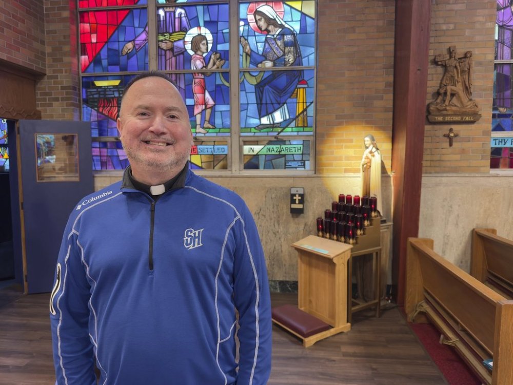 This image provided by the Religion News Service shows Rev. Jim Worth posing for a photo at St. Joseph Catholic Church on March 28, 2025, in Maplewood, N.J. (Kathryn Post/Religion News Service via AP)