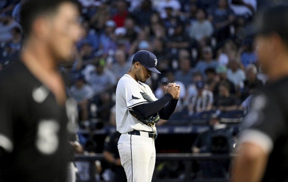 Tampa Bay Rays pitcher Taj Bradley reacts after Chicago White Sox's Colson Montgomery's three-run home run during the second inning of a baseball game against the Tampa Bay Rays Wednesday, July 23, 2025, in Tampa, Fla. (AP Photo/Jason Behnken)