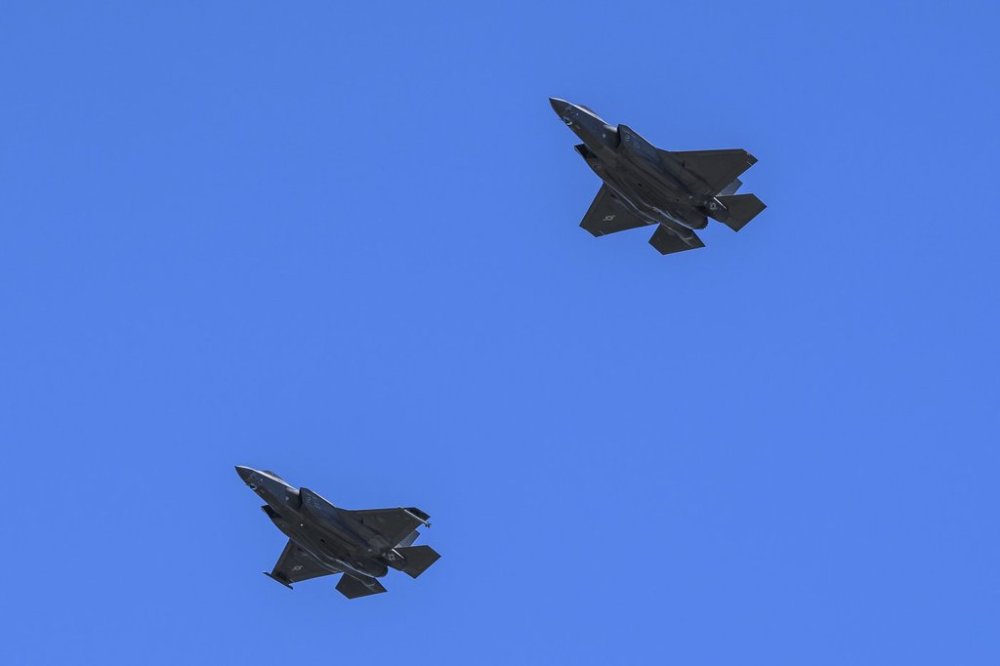 Two F-35 Lightning fighter aircraft participate in a flypast celebrating the RCAF centennial on Canada Day, Monday, July 1, 2024. THE CANADIAN PRESS/Justin Tang