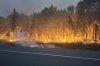 A wildfire is seen in this handout photo, burning near Miramichi, N.B., on Tuesday, Aug. 12, 2025. THE CANADIAN PRESS/Handout — Government of New Brunswick (Mandatory Credit)