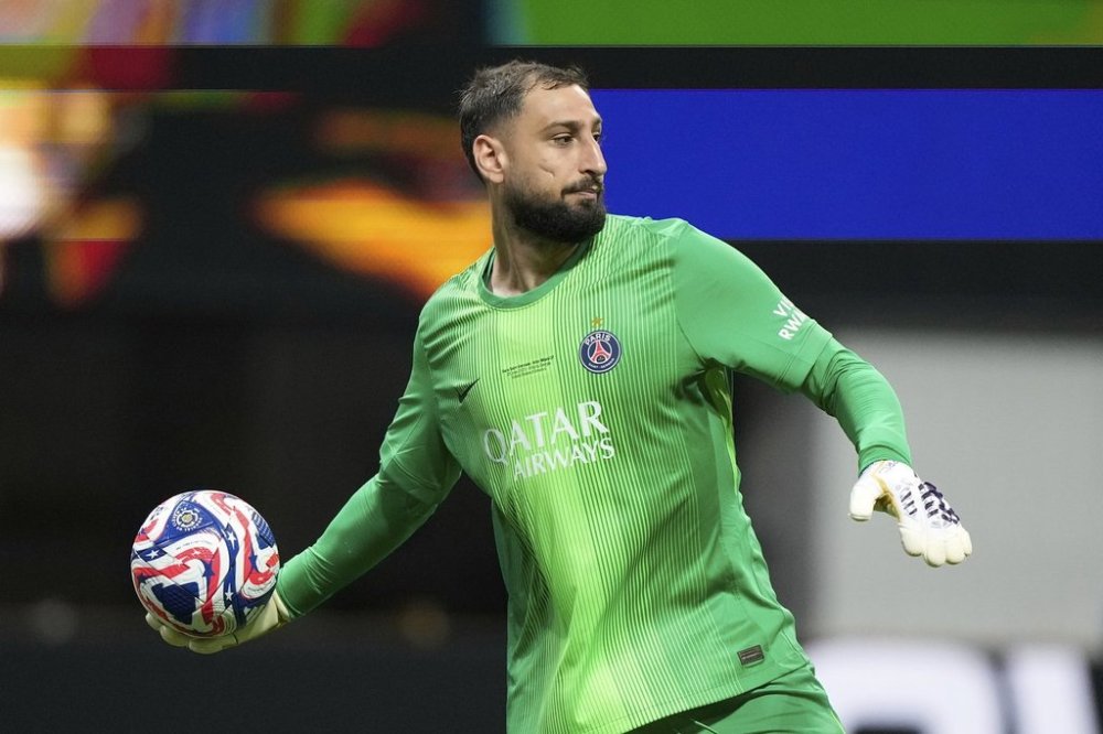 FILE - Paris Saint-Germain's goalkeeper Gianluigi Donnarumma puts the ball back in play during the Club World Cup round of 16 soccer match between PSG and Inter Miami in Atlanta, Sunday, June 29, 2025. (AP Photo/Brynn Anderson, File)