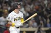 San Diego Padres' Ryan O'Hearn watches his two-run home run against the San Francisco Giants during the seventh inning of a baseball game Monday, Aug 18, 2025, in San Diego. (AP Photo/Orlando Ramirez)