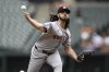 Houston Astros starting pitcher Spencer Arrighetti throws during the first inning of a baseball game against the Baltimore Orioles, Sunday, Aug. 24, 2025, in Baltimore. (AP Photo/Nick Wass)