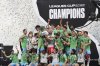 The Seattle Sounders lift the trophy as they celebrate beating Inter Miami in a Leagues Cup final soccer match Sunday, Aug. 31, 2025, in Seattle. (AP Photo/Lindsey Wasson)