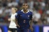FILE - France's Grace Geyoro celebrates after scoring the opening goal from the penalty spot during the Women's Euro 2025 quarterfinals soccer match between France and Germany at St. Jakob-Park in Basel, Switzerland, Saturday, July 19, 2025. (AP Photo/Alessandra Tarantino, File)