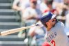 Chicago Cubs' Nico Hoerner hits a double during the fourth inning of a baseball game against the Los Angeles Angels, Sunday, Aug. 24, 2025, in Anaheim, Calif. (AP Photo/Eric Thayer)