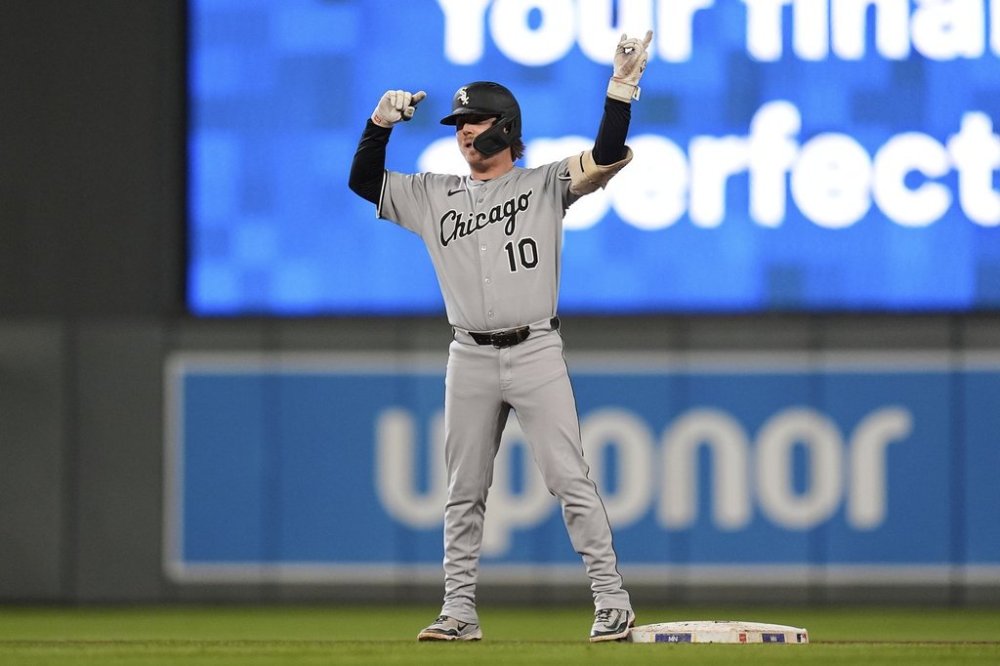 Chicago White Sox's Chase Meidroth (10) gestures after hitting a double during the fourth inning of a baseball game against the Minnesota Twins Thursday, Sept. 4, 2025, in Minneapolis. (AP Photo/Abbie Parr)