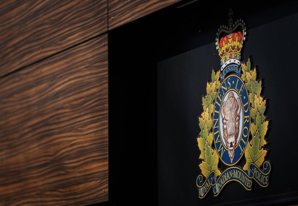 The RCMP logo is seen outside the force's 'E' division headquarters in Surrey, B.C., March 16, 2023. THE CANADIAN PRESS/Darryl Dyck