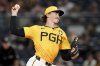 Pittsburgh Pirates pitcher Bubba Chandler delivers during the seventh inning of a baseball game against the Colorado Rockies, Friday, Aug. 22, 2025, in Pittsburgh. (AP Photo/Matt Freed)