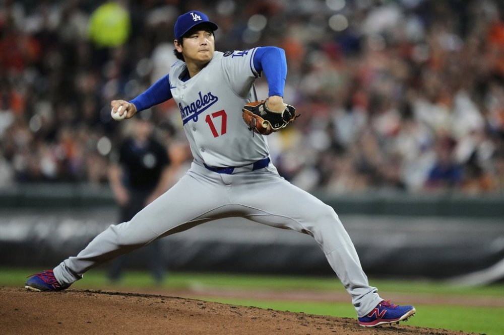 Los Angeles Dodgers starting pitcher Shohei Ohtani delivers during the second inning of a baseball game against the Baltimore Orioles, Friday, Sept. 5, 2025, in Baltimore. (AP Photo/Stephanie Scarbrough)