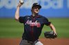 Atlanta Braves starting pitcher Erick Fedde delivers during the first inning of a baseball game against the Cleveland Guardians, Sunday, Aug. 17, 2025, in Cleveland. (AP Photo/David Dermer)