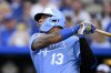 Kansas City Royals' Salvador Perez watches his three-run home run sail into the stands during the first inning of a baseball game against the Minnesota Twins in Kansas City, Mo., Saturday, Sept. 6, 2025. (AP Photo/Reed Hoffmann)