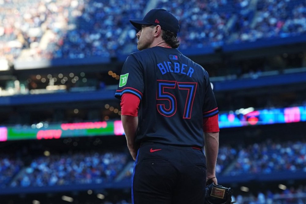 Toronto Blue Jays pitcher Shane Bieber (57) steps onto the field before first inning MLB baseball action against the Milwaukee Brewers in Toronto on Friday, Aug. 29, 2025. THE CANADIAN PRESS/Chris Young