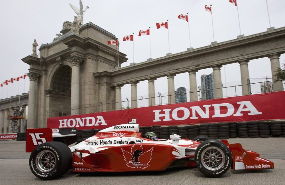 Paul Tracy, of Toronto, zooms in front of Prince's Gate in the second practice session for the Honda Indy Toronto in Toronto on Friday July 10, 2009.THE CANADIAN PRESS/Frank Gunn