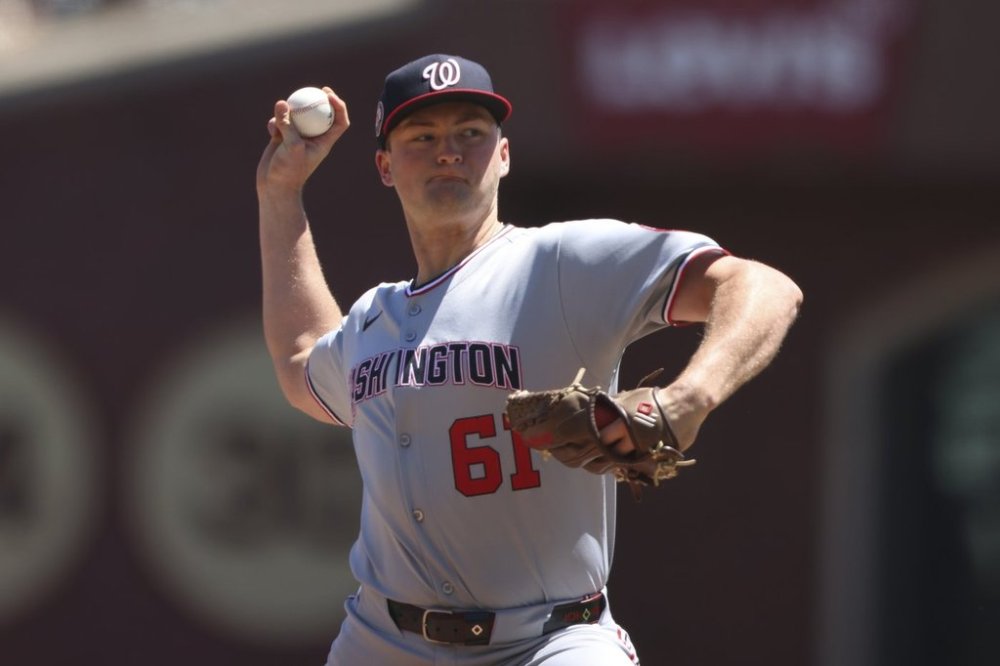 Washington Nationals starting pitcher Brad Lord throws to an San Francisco Giants batter during the first inning of a baseball game Saturday, Aug. 9, 2025, in West Sacramento, Calif. (AP Photo/Scott Marshall)