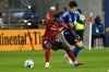 Toronto FC's Richie Laryea, left, is held by CF Montreal's Olger Escobar during first half MLS soccer action in Toronto on Saturday, August 30, 2025. THE CANADIAN PRESS/Jon Blacker