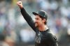 New York Mets pitcher Nolan McLean gestures to the crowd after a win in a baseball game against the Seattle Mariners, Saturday, Aug. 16, 2025, in New York. (AP Photo/Heather Khalifa)