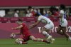 Canada's Karen Paquin, left, scores a try past Brazil's Raquel Kochhann, centre, and Thalita da Silva Costa in their women's rugby sevens 9-12 placing match at the 2020 Summer Olympics, Friday, July 30, 2021, in Tokyo, Japan. (AP Photo/Shuji Kajiyama)