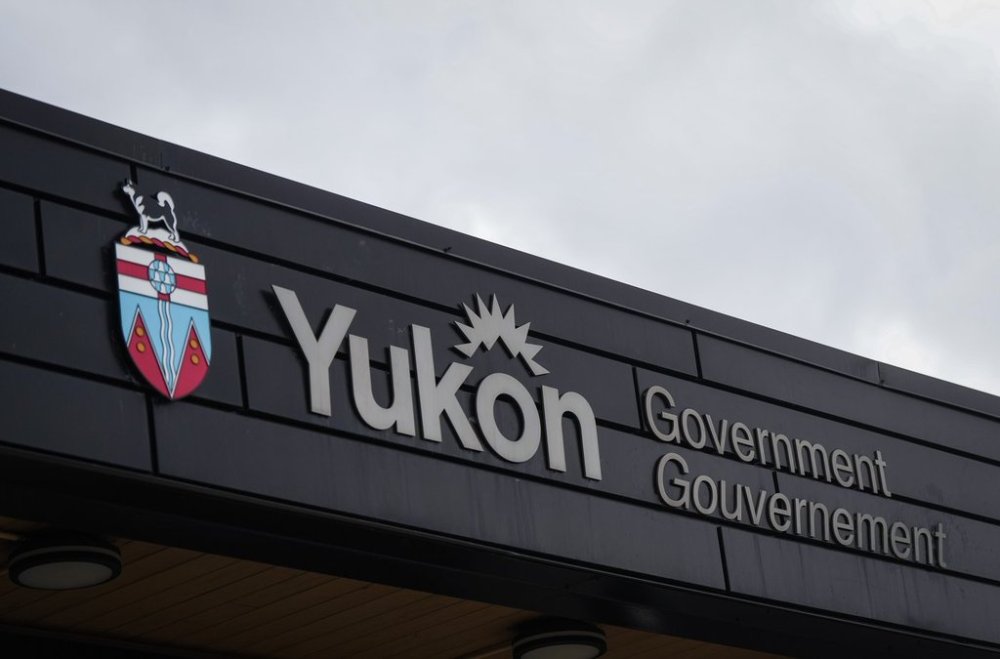 The coat of arms of Yukon is seen on the outside of the Yukon Legislative Building, in Whitehorse, on Wednesday, July 23, 2025. THE CANADIAN PRESS/Darryl Dyck