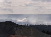 A water bomber drops water onto a wildfire burning in the Paddy's Pond area just outside St. John's, N.L., on Wednesday, Aug. 13, 2025. THE CANADIAN PRESS/Elling Lien