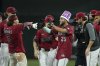 Arizona Diamondbacks' Adrian Del Castillo (25) celebrates his walk-off single against the Cleveland Guardians with teammates, including Alek Thomas (5) and Zac Gallen, right, after a baseball game Wednesday, Aug. 20, 2025, in Phoenix. (AP Photo/Ross D. Franklin)