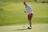 Alena Sharp, of Canada, reacts after putting on the 9th green during the final round of the women's golf event at the 2024 Summer Olympics, Saturday, Aug. 10, 2024, at Le Golf National, in Saint-Quentin-en-Yvelines, France. (AP Photo/George Walker IV)
