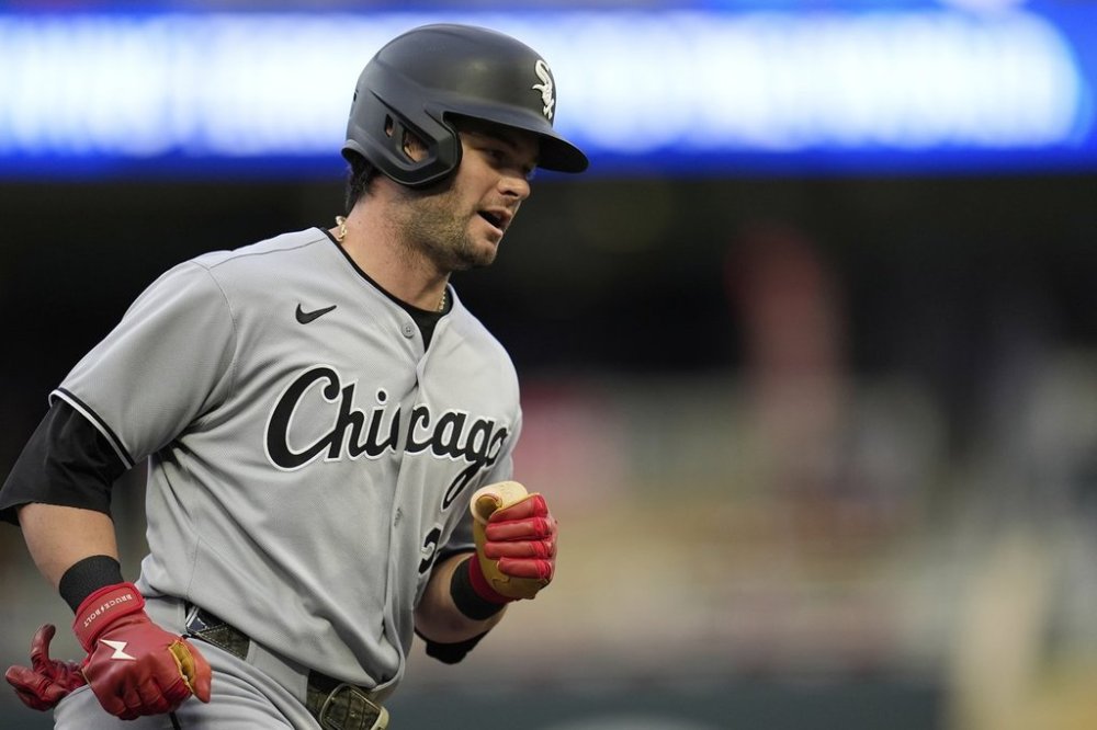 Chicago White Sox's Andrew Benintendi runs the bases after hitting a solo home run during the second inning of a baseball game against the Minnesota Twins Tuesday, Sept. 2, 2025, in Minneapolis. (AP Photo/Abbie Parr)