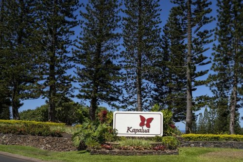 FILE - A Kapalua Ridge Villas sign is viewed on Oct. 3, 2023, in Lahaina, Hawaii. (AP Photo/Mengshin Lin, File)