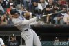New York Yankees' Aaron Judge hits a home run against the Chicago White Sox during the fourth inning of a baseball game Saturday, Aug. 30, 2025, in Chicago. (AP Photo/David Banks)