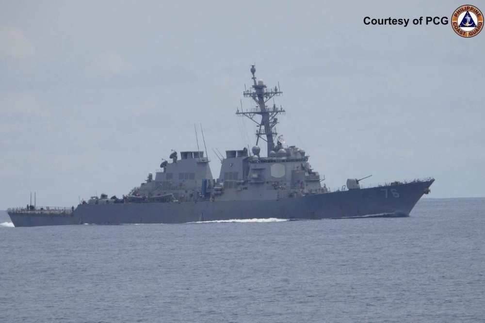 In this photo, provided by the Philippine Coast Guard, United States Navy USS Higgins (DDG 76) conduct freedom of navigation operations (FONOP) at the South China Sea on Wednesday Aug. 13, 2025. (Philippine Coast Guard via AP)