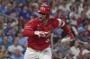 St. Louis Cardinals' Willson Contreras celebrates after hitting an RBI single during the fifth inning of a baseball game against the Chicago Cubs Friday, Aug. 8, 2025, in St. Louis. (AP Photo/Jeff Roberson)