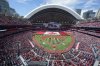 A large Canadian flag is unfurled before the start of the MLB game between the New York Yankees and the Toronto Blue Jays at Rogers Centre on Canada Day, Tuesday, July 1, 2025.  THE CANADIAN PRESS/Frank Gunn