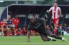 Napoli's Romelu Lukaku reacts after an injury during a friendly soccer match between Napoli and Olympiakos at the Teofilo Patini Stadium in Castel Di Sangro, Italy, Thursday, Aug. 14 , 2025. (Alessandro Garofalo/LaPresse via AP)