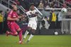St. Louis City's João Klauss, left, and Vancouver Whitecaps' Ralph Priso (13) challenge for the ball during the second half of an MLS soccer match Saturday, April 19, 2025, in St. Louis. (AP Photo/Jeff Roberson)