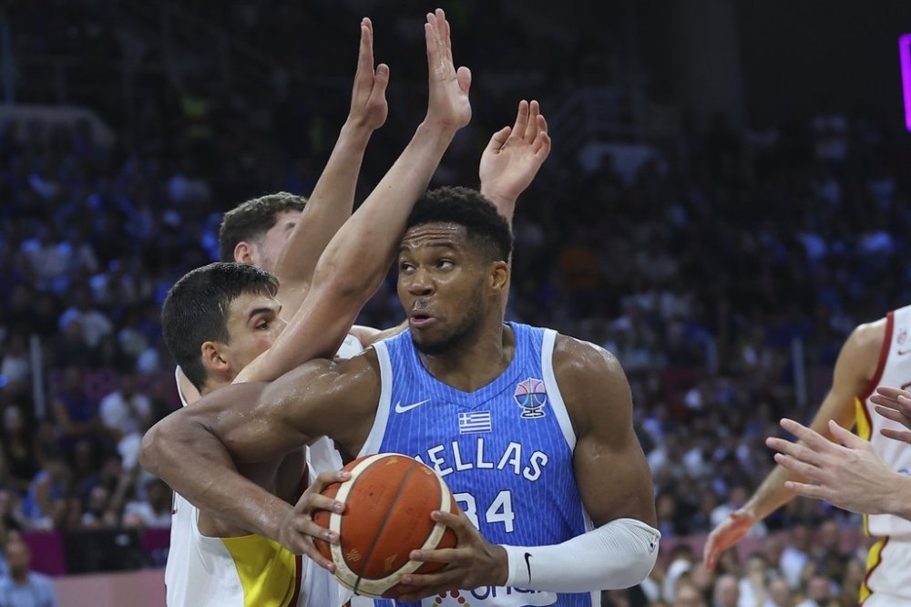 Greece's Giannis Antetokounmpo drives the ball during the Eurobasket, European Basketball Championship Group C match between Spain and Greece at Spyros Kyprianou Arena, in Limassol, Cyprus, Thursday, Sept. 4, 2025. (AP Photo/Sakis Savvides)