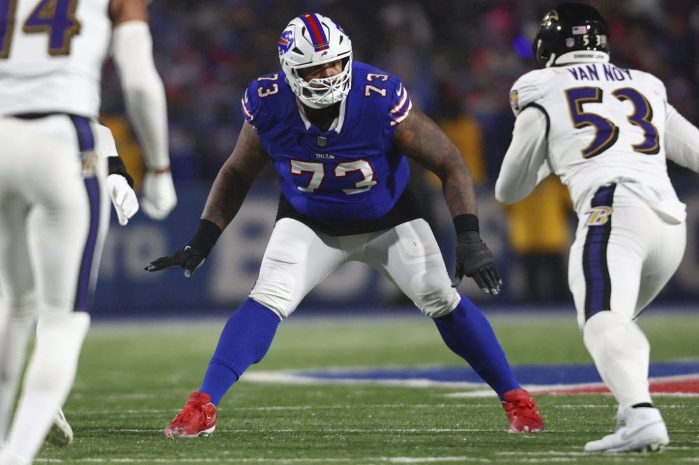 FILE - Buffalo Bills offensive tackle Dion Dawkins (73) looks to block during the second half of an NFL football divisional playoff game against the Baltimore Ravens in Orchard Park, N.Y., Jan. 19, 2025. (AP Photo/ Jeffrey T. Barnes, File)