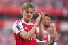 FILE - Arsenal's Martin Odegaard greets supporters after the English Premier League soccer match between Arsenal and Newcastle United at Emirates stadium in London, Sunday, May 18, 2025. (AP Photo/Kirsty Wigglesworth, File)